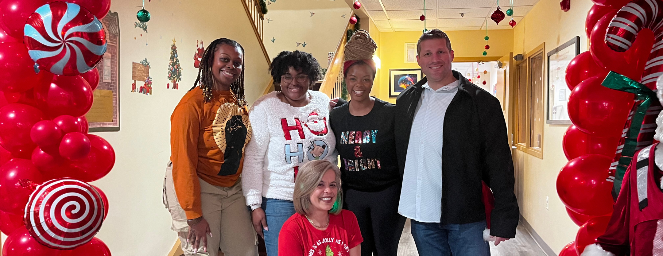 Group photo of Youth Action team members with Red Cross House's Yaly Alvarez