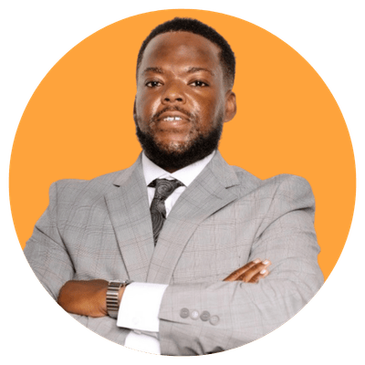 Shamar Stokes, Youth Action mentor in gray suit, orange background