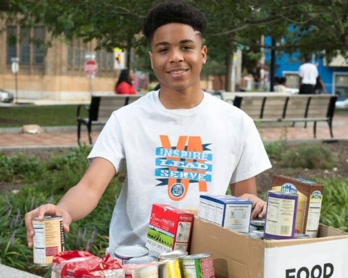 youth-action-inspiring-leaders-program-student-serving-food-drive
