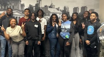 Youth Action students, facilitators, friends, and families attending a fun outing at Dave & Busters